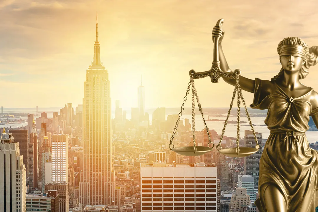 New York personal injury lawyer in Manhattan, NYC skyline at sunrise